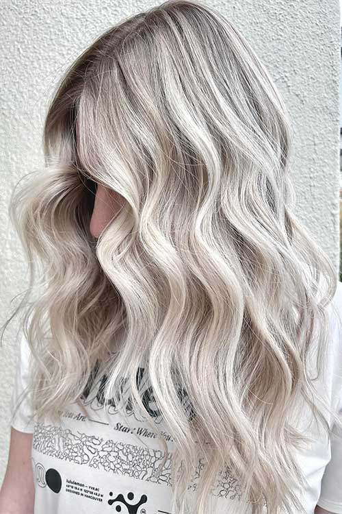 Long hair dyed in dimensional light ash blonde hair Long hair dyed in dimensional light ash blonde hair