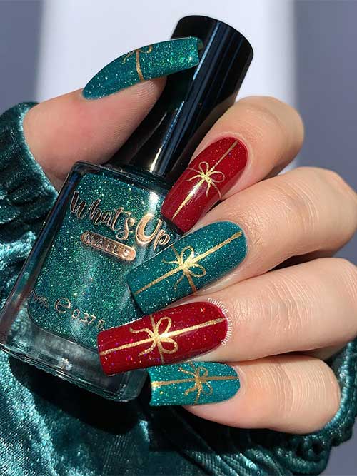 Long square-shaped sparkling glitter green and red Christmas nails adorned with gold glitter gift wrap nail art