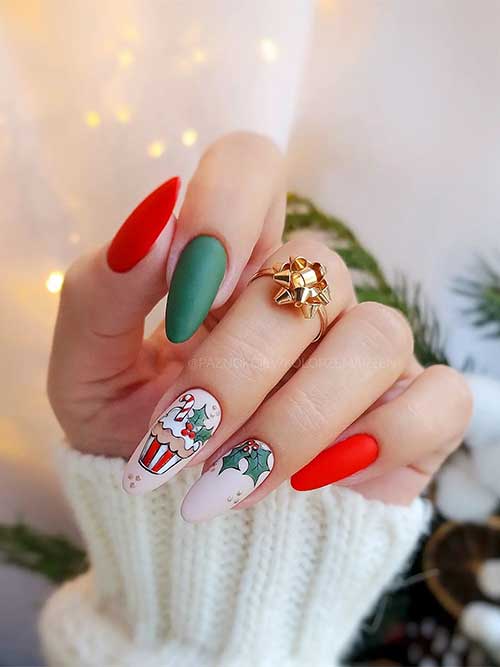 Pretty matte beige, red, and green Christmas nails with two accent nude nails adorned with holly and candy cane nail art