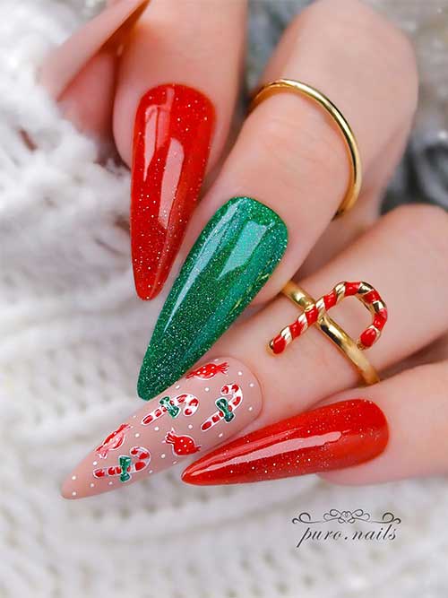 Stunning long almond-shaped nude green and red Christmas nails feature glitter red and green nails with two matte nude nails