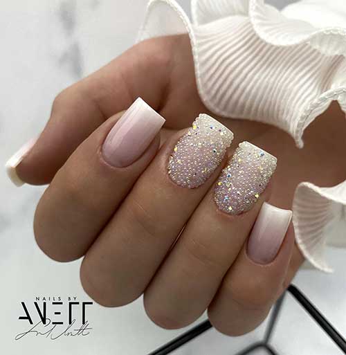 Gorgeous short French ombre nails with two accent nails adorned with tiny pearl rhinestones