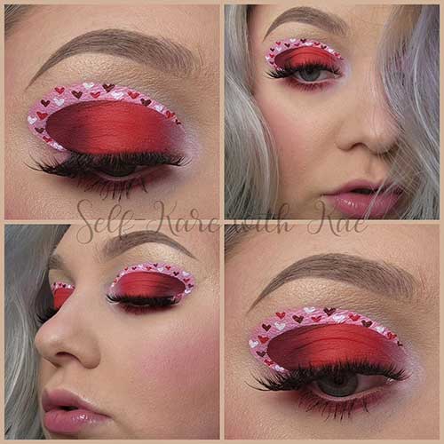 Matte red and pink Valentine's Day eye makeup with white, red, and dark red-brown small heart shapes and glossy nude lips