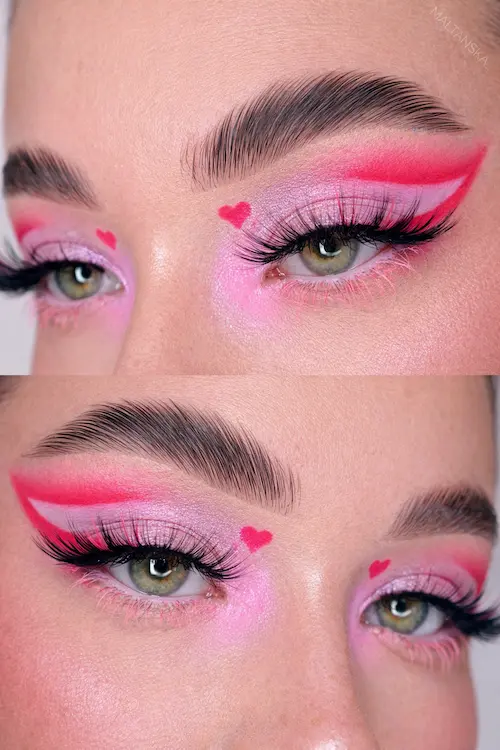 Level up your Valentine's Day makeup with this vibrant red and pink look! Featuring a soft nude pink lid and a bold red graphic liner, this aesthetic is the ultimate inspo for creative eye makeup. Whether you're looking for date night beauty or a trendy editorial makeup style, this sharp wing is a total showstopper. Close up of eye makeup featuring nude pink eyeshadow and a vibrant red graphic winged eyeliner for Valentine's Day.
