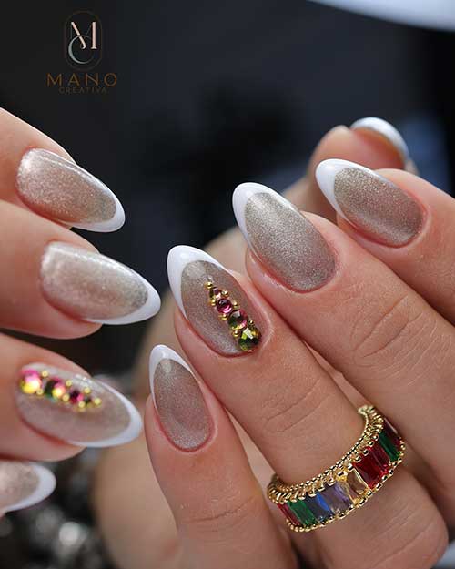 Sparkling white French tip nails almond shape over sparkling rose gold base color