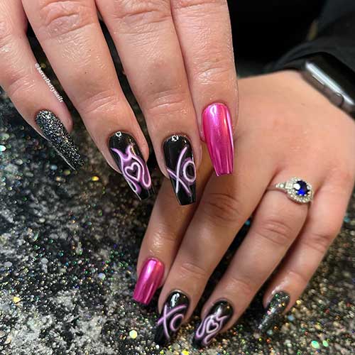 Coffin black Valentine’s Day nails adorned with xo and heart nail art besides glitter black and chrome pink accent nails