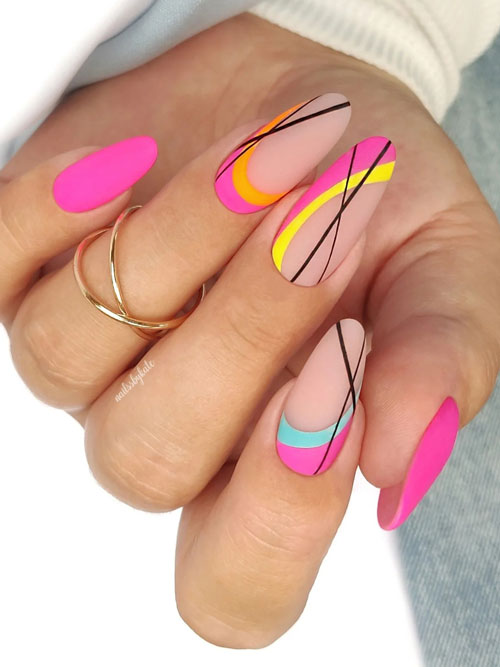 Colorful swirl nail design featuring neon pinks, yellows, and turquoise with black lines on a matte nude base. Colorful swirl nail design featuring neon pinks, yellows, and turquoise with black lines on a matte nude base.