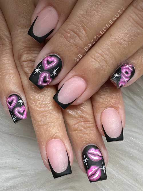 Short matte black Valentine’s Day nails with two French nails and black nails adorned with XOXO, lip, and heart nail art