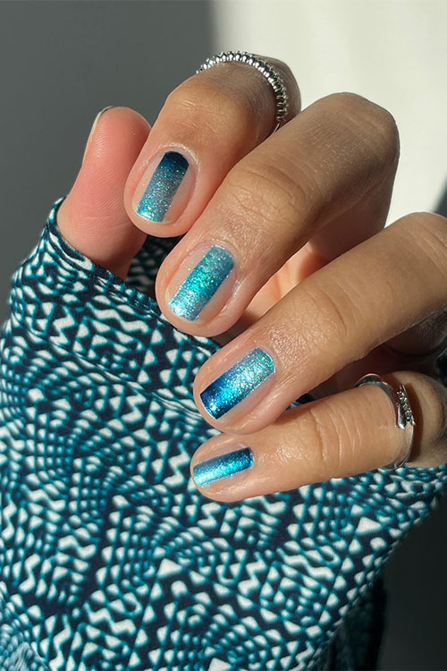 Sparkly short blue geometric nails