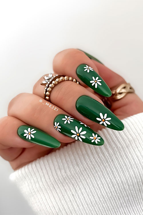 Cute long almond shaped dark green nails with daisies