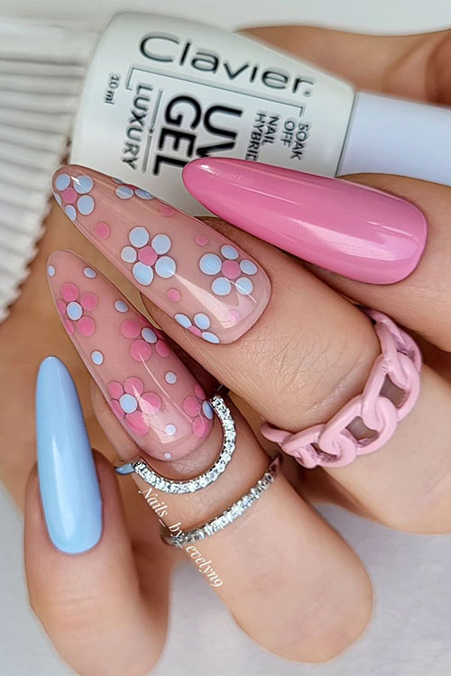 Long almond shaped pink and blue spring nails with floral accent nails are one of the best manicure designs for spring 2024