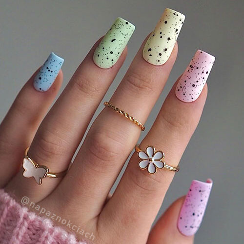 Long square-shaped speckled multicolored Easter nails are one of the best Easter nail design ideas for 2024