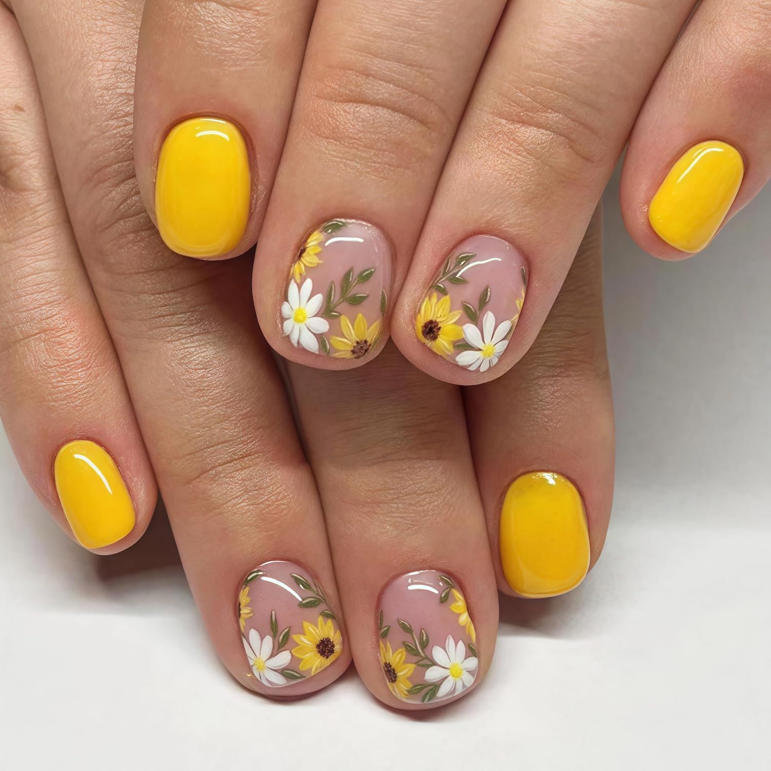 Bright yellow sunflower press-on nails with floral designs, designed for a cheerful spring and summer manicure for women. Bright yellow sunflower press-on nails with floral designs, designed for a cheerful spring and summer manicure for women.