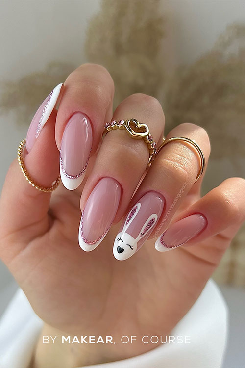 Long classic Easter white French tip nails with rose gold glitter and bunny nail art design