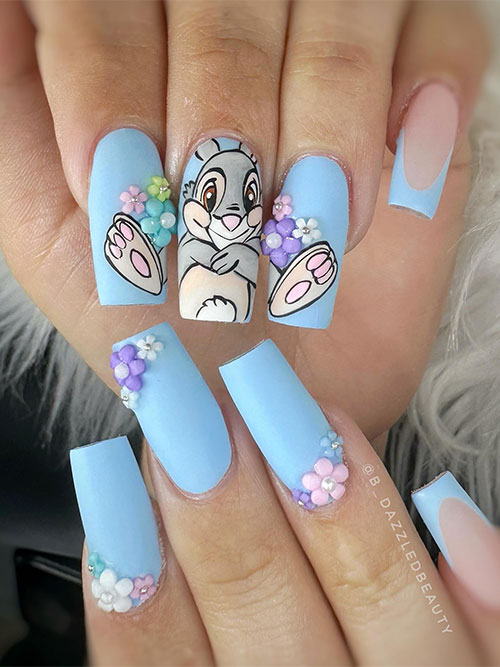 Matte baby blue bunny nails with flowers on accent nails