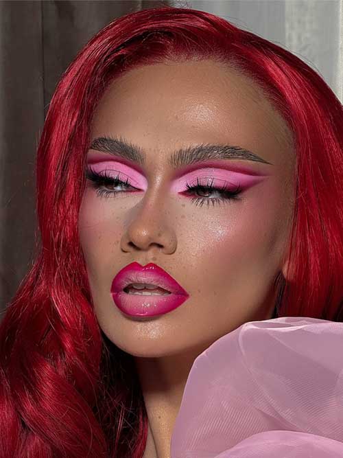 Blended pink eyeshadow look with sharp eyeliner, finished with shimmery blush and sparkling ombré pink lips. Blended pink eyeshadow look with sharp eyeliner, finished with shimmery blush and sparkling ombré pink lips.