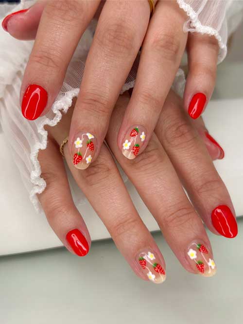 Charming short nails with a nude base, decorated with vibrant red strawberries and green leaves for a whimsical look. Charming short nails with a nude base, decorated with vibrant red strawberries and green leaves for a whimsical look.