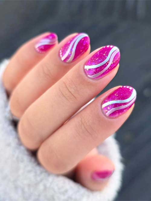 Ethereal pink swirl nails with glittering hues and delicate stardust patterns, evoking a mesmerizing cosmic beauty. Ethereal pink swirl nails with glittering hues and delicate stardust patterns, evoking a mesmerizing cosmic beauty.