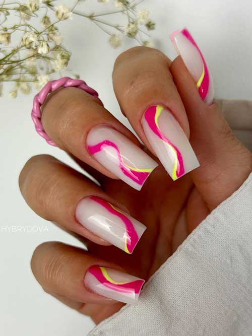 Neon swirl nails feature vibrant hot pink and yellow against a semi-sheer white, creating a bold and energetic design. Neon swirl nails feature vibrant hot pink and yellow against a semi-sheer white, creating a bold and energetic design.