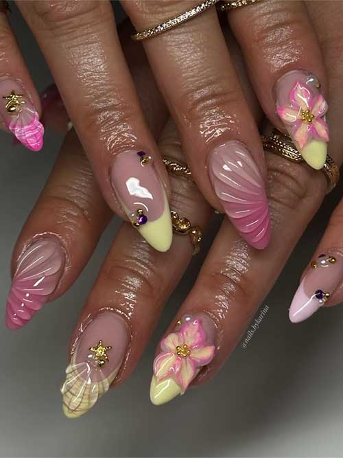Tropical nail design showcasing 3D seashells, starfish, and flowers in pink and yellow, enhanced with gold and gems. Tropical nail design showcasing 3D seashells, starfish, and flowers in pink and yellow, enhanced with gold and gems.