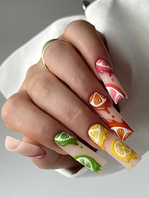 Bright multicolor nails inspired by citrus fruits, showcasing lime and orange designs with a whimsical dripping effect. Bright multicolor nails inspired by citrus fruits, showcasing lime and orange designs with a whimsical dripping effect.