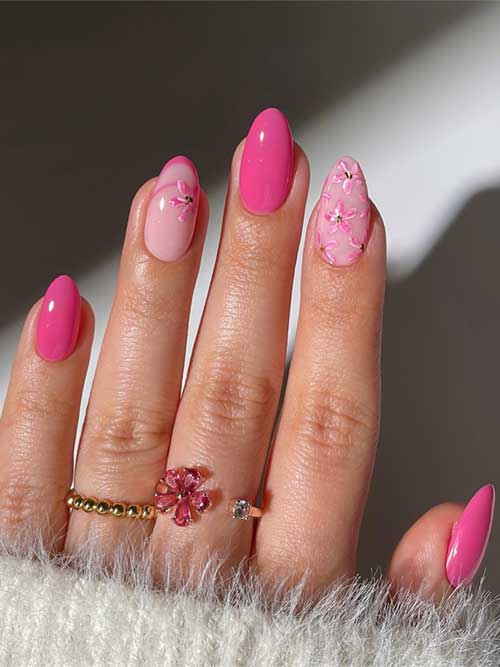 Charming short pink nails with a mix of soft and bold shades, adorned with elegant floral motifs for a feminine touch. Charming short pink nails with a mix of soft and bold shades, adorned with elegant floral motifs for a feminine touch.