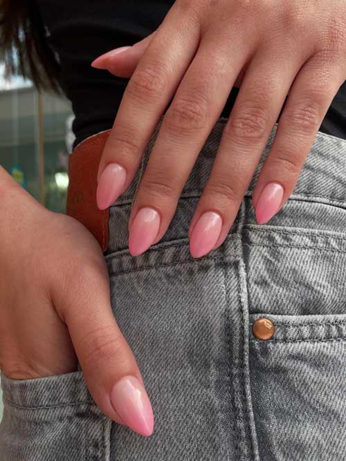 Elegant short pink nails featuring a light ombre gradient from sheer to soft pink tips, perfect for a timeless manicure. Elegant short pink nails featuring a light ombre gradient from sheer to soft pink tips, perfect for a timeless manicure.