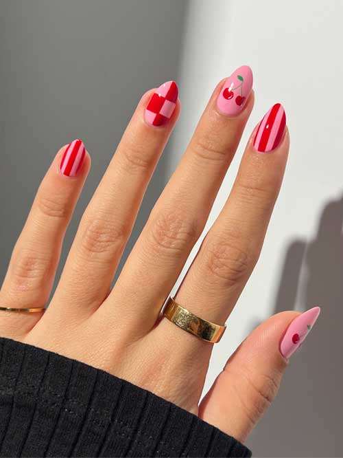 Stylish pink nails featuring playful cherries, stripes, and checks for a fun, fruity twist on a classic trend. Stylish pink nails featuring playful cherries, stripes, and checks for a fun, fruity twist on a classic trend.