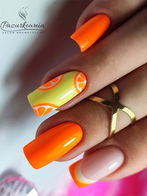 Vibrant orange nails adorned with citrus patterns on a sunny yellow base, showcasing a chic orange French tip. Vibrant orange nails adorned with citrus patterns on a sunny yellow base, showcasing a chic orange French tip.