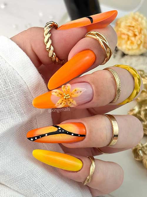 Vibrant orange nails with yellow flower designs, bold black stripes, and white dots blend fun and sophistication beautifully. Vibrant orange nails with yellow flower designs, bold black stripes, and white dots blend fun and sophistication beautifully.