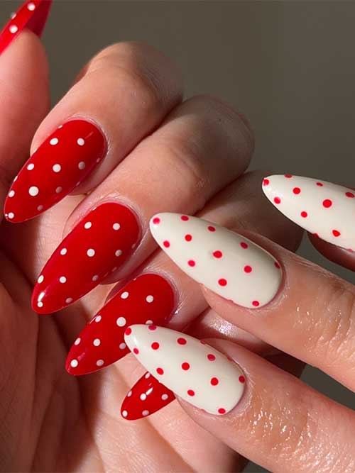 Red and white polka dot nails in a sleek almond shape, featuring a glossy finish for a fun yet sophisticated look. Red and white polka dot nails in a sleek almond shape, featuring a glossy finish for a fun yet sophisticated look.