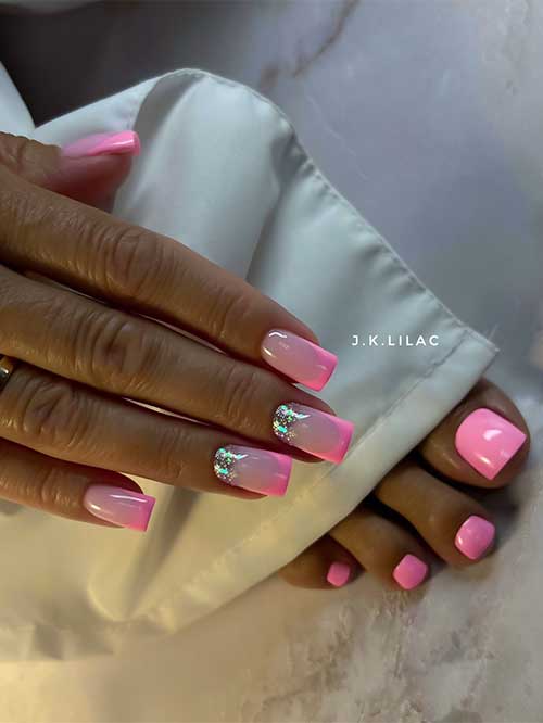 Pink manicure and pedicure set with milky gradients, vivid French tips, and glitter accents for a glamorous look.