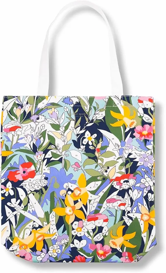 Kate Spade canvas tote bag for women with colorful floral print and sturdy white handles on a clean white background