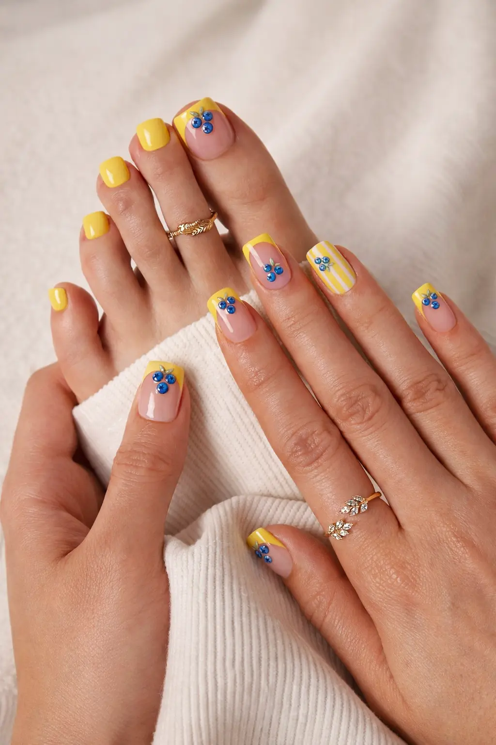 Looking for the perfect summer pedicure and manicure combo? 💅✨ Get this effortless, trendy look at home with BTArtbox Press-On Toenails in "Blueberry Rain"! These short square press-on toenails feature a vibrant yellow French tip design paired with adorable 3D blueberry rhinestones. Easy to apply, waterproof, and perfect for sandal season. Say goodbye to the salon and hello to flawless, long-lasting DIY nail art! Tap to shop the full 30-piece all-in-one kit. ☀️💛 #pressontoenails #summernails #pedicureideas Short square press on toenails in Blueberry Rain color – BTArtbox 3D yellow French tip design applied on foot