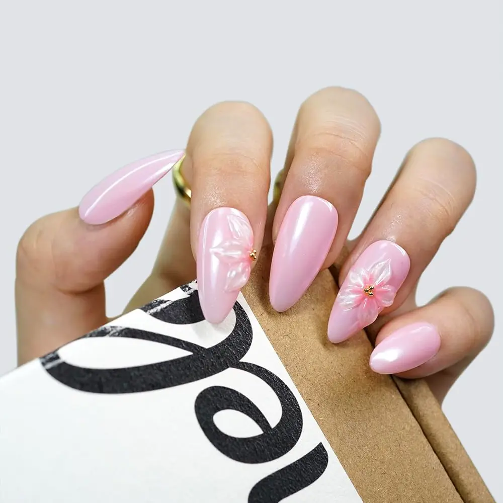 Handmade 3D gel press on nails — Aurora Petal Pink with a delicate floral accent.