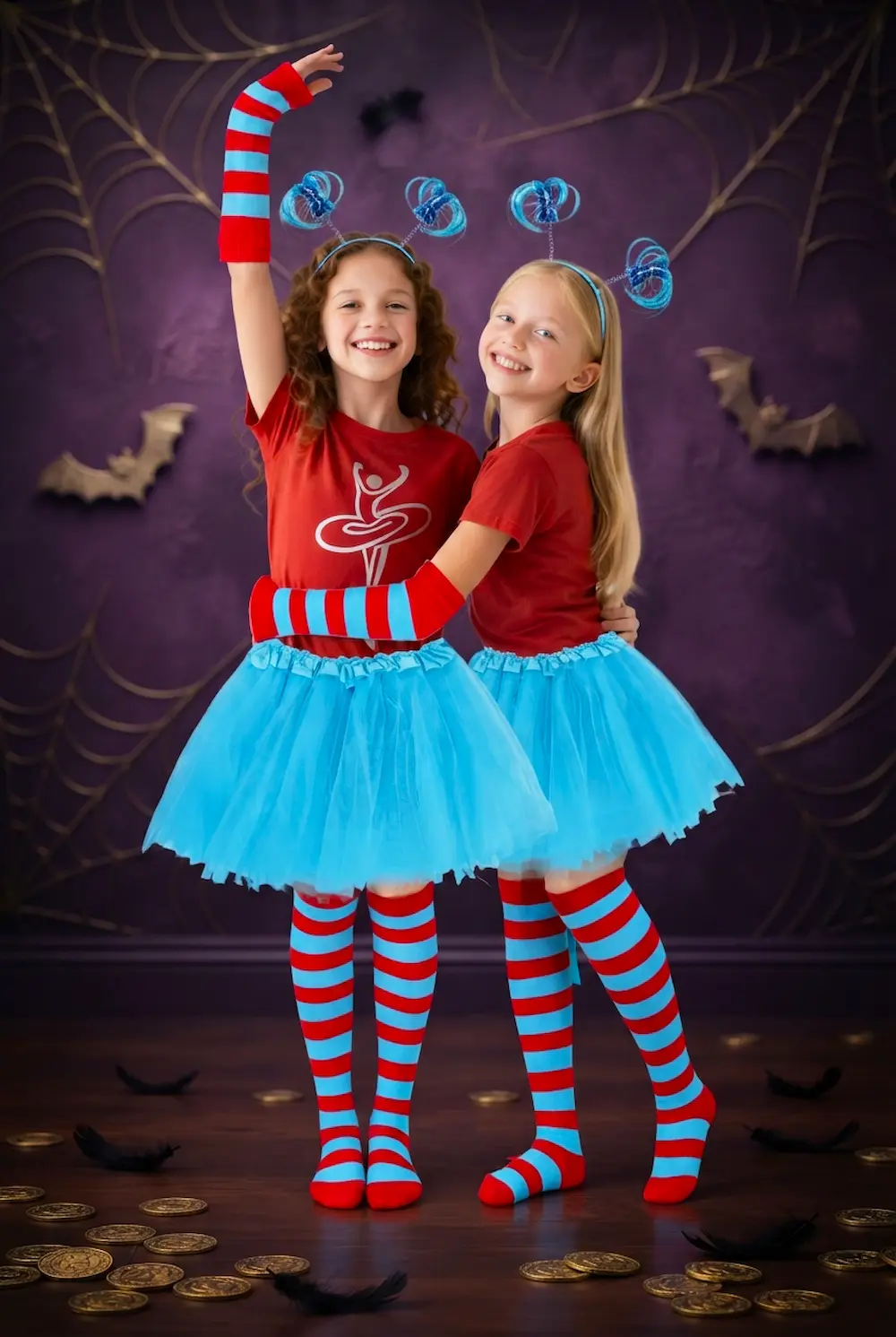 Bring favorite storybook and Halloween characters to life with this vibrant, eye-catching costume set! Perfect for school events, dress-up days, and themed parties, this complete outfit includes a fluffy multi-layer blue tutu skirt, bold red and blue striped gloves, matching knee-high socks, and a playful bouncy ponytail headband. Designed for all-day comfort and standout style! #KidsCostumes #BookCharacterCostume #HalloweenCostumesForKids #GirlsCostume #CosplayKids #PartyOutfits Two smiling girls twirling in a book character costume for girls with blue tutus, striped socks, striped gloves and blue headbands